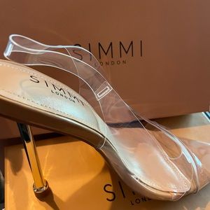 BRAND NEW nude high heels with clear strapping. Size 6 from SIMMI LONDON